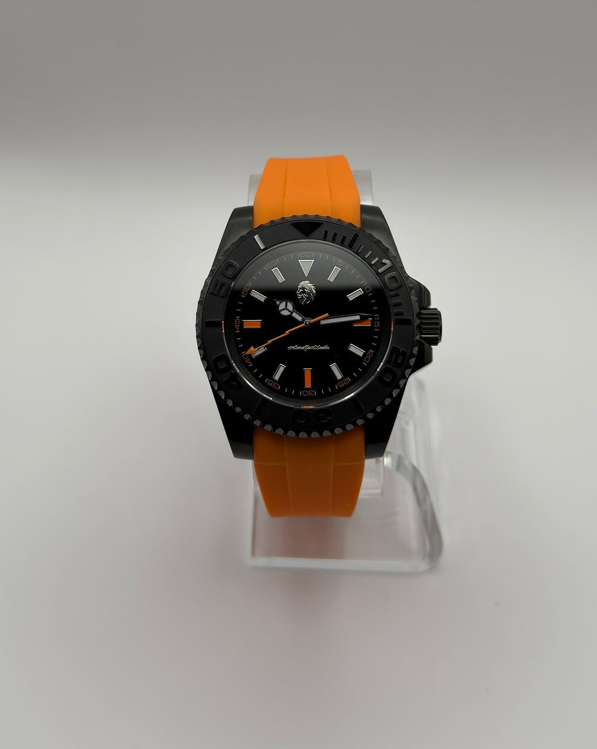 STOIC The Thalor: Front view of the black dial and orange strap