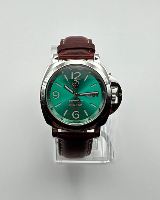 STOIC The Arete Verde: Front view of the green dial and brown strap.