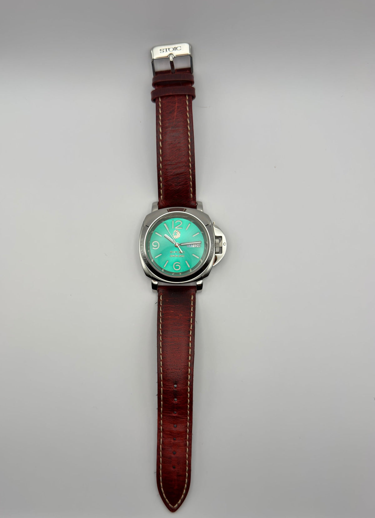 STOIC The Arete Verde: Full front view with green dial and brown leather strap