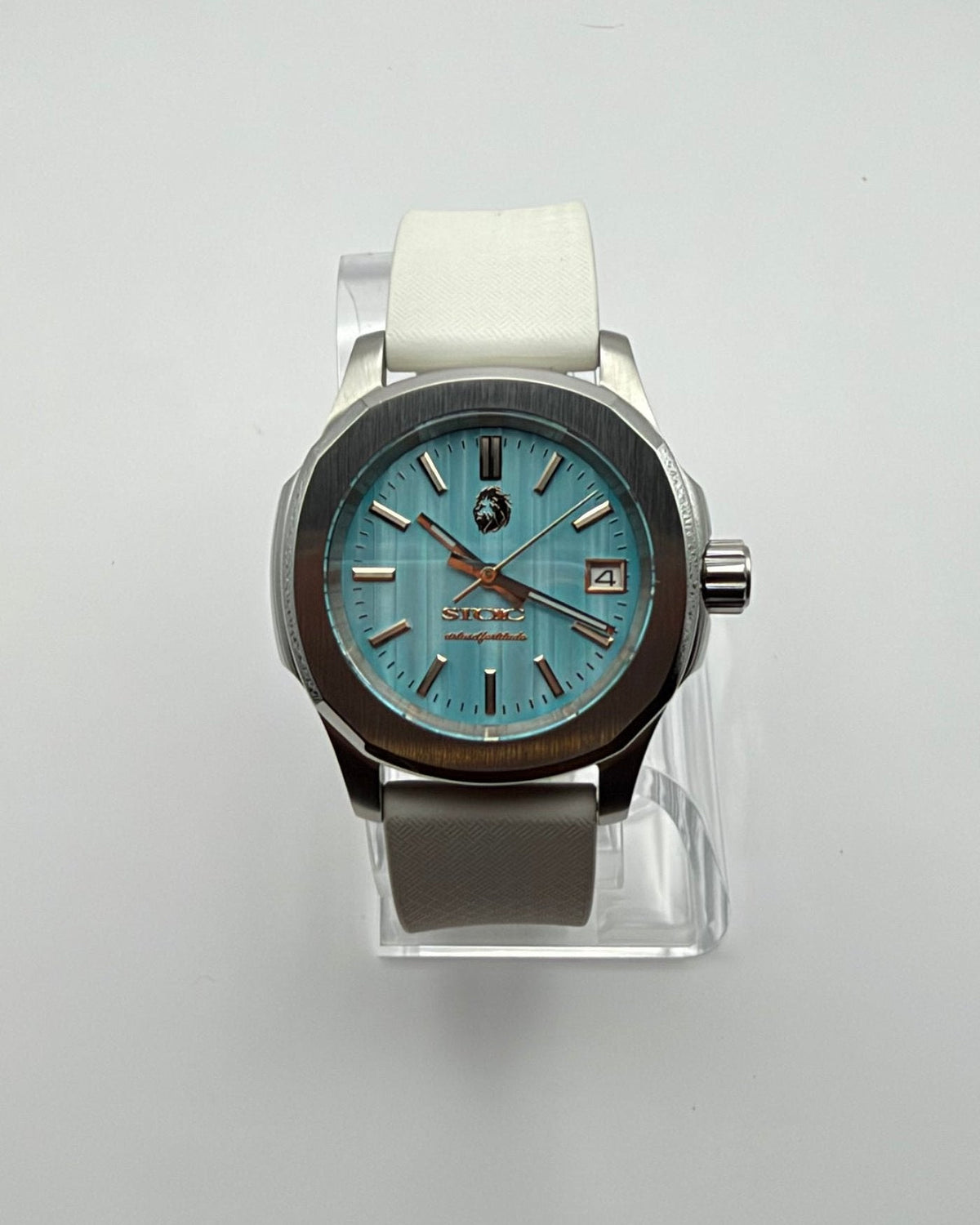 STOIC The Aether Aqua: Front view of the aqua dial and white strap.