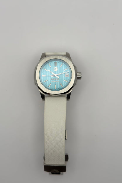 STOIC The Aether Aqua: Full front view of the aqua dial and white strap