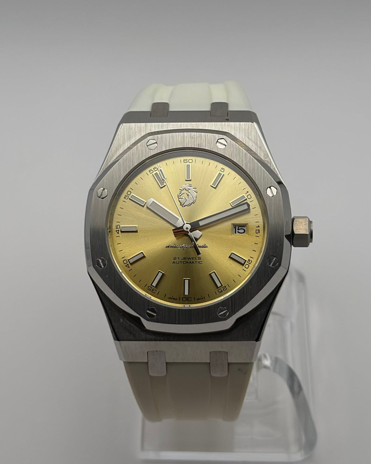 STOIC The Thalassa Gold: Front view of the gold-tone dial and light strap.