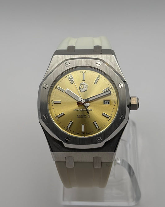 STOIC The Thalassa Gold: Front view of the gold-tone dial and light strap.