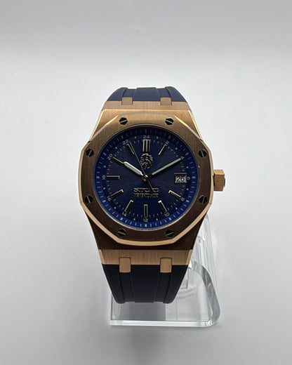 STOIC The Meridian: Front view of the blue dial, gold-tone case and blue strap.