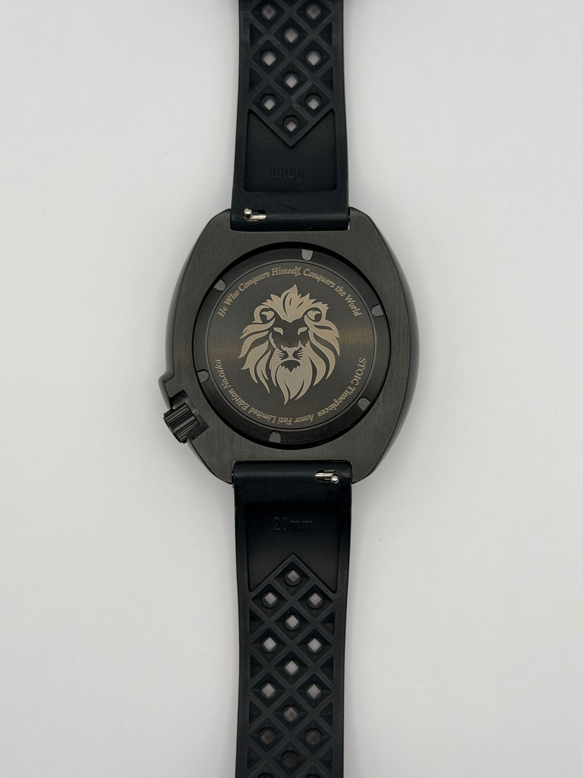 Scorpius back view with a lion engraving and the patterned underside of the black strap.