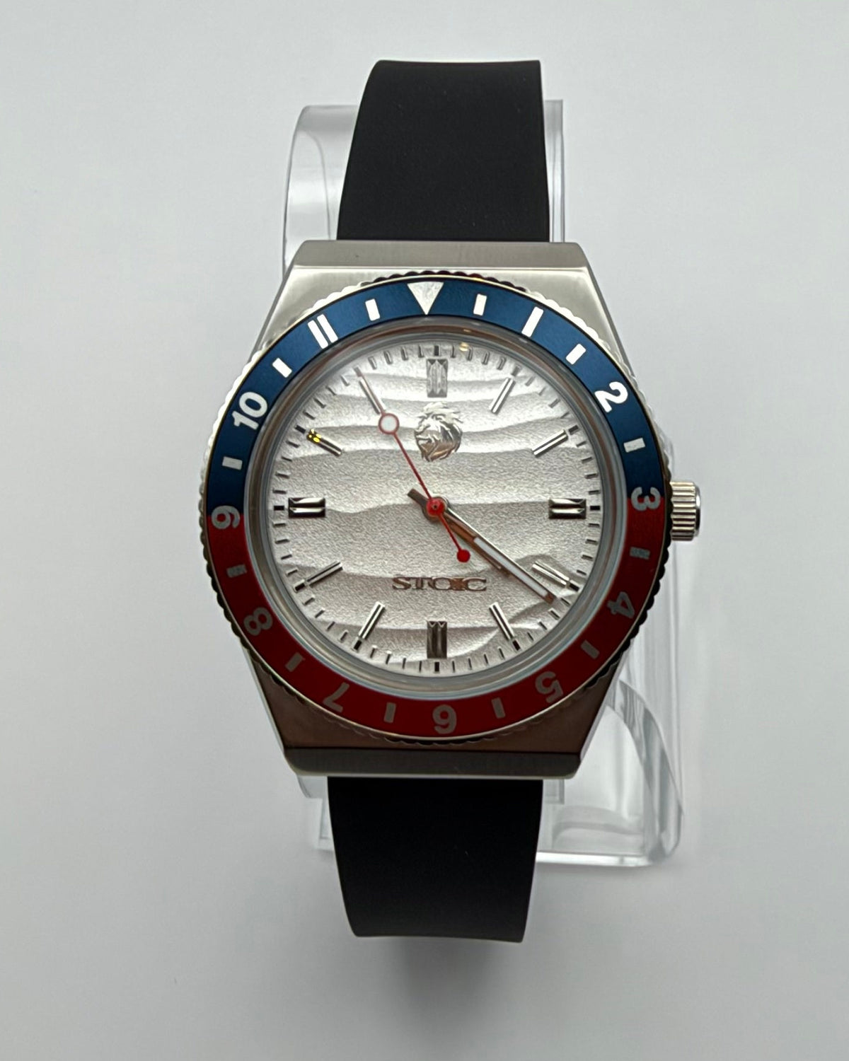 STOIC The Voyager: Front view of the light dial, red-and-blue bezel and black strap.