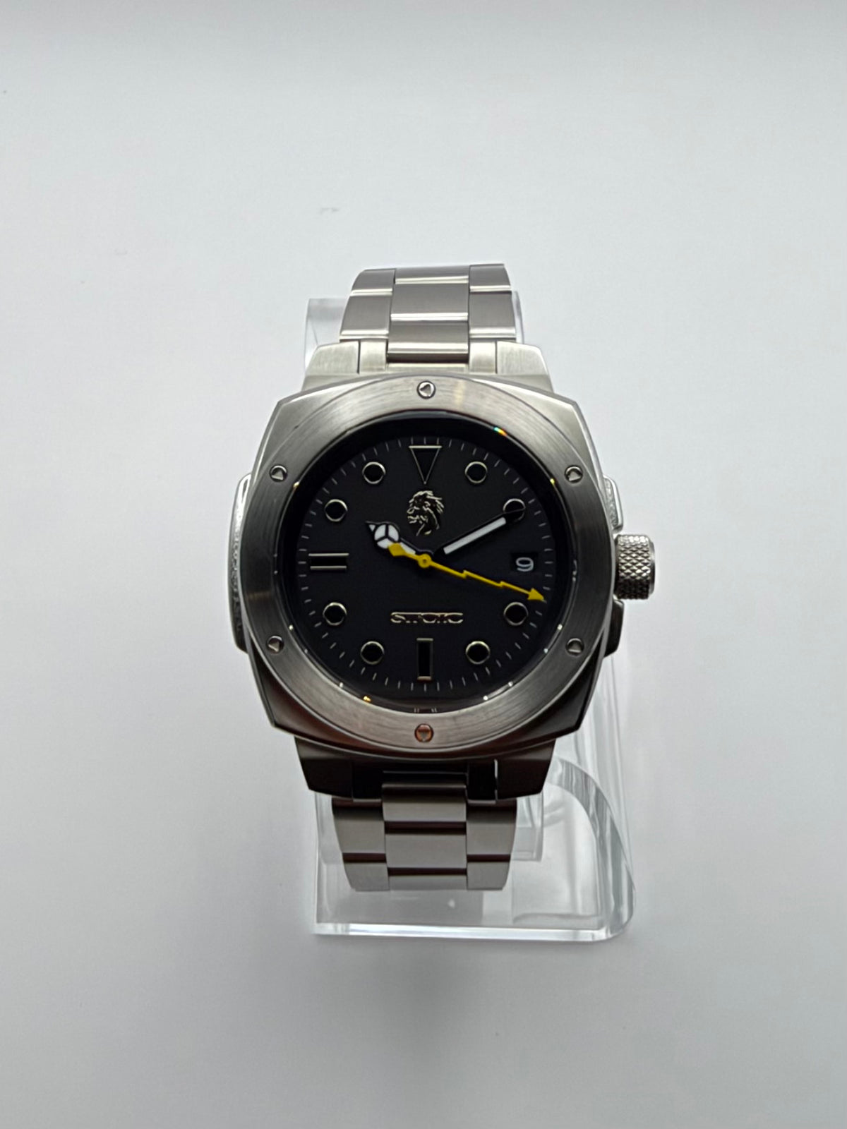 Vigor Dragonsteel Edition front view showing its black dial, yellow hand and silver-tone case.