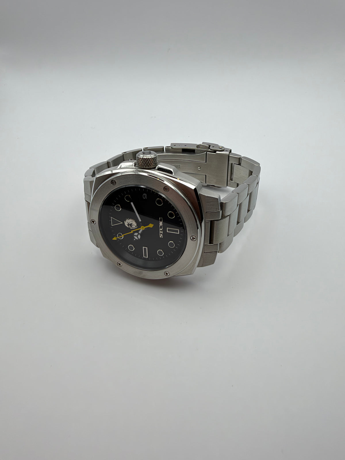 Vigor Dragonsteel Edition resting at an angle, showing the silver-tone case and link bracelet.