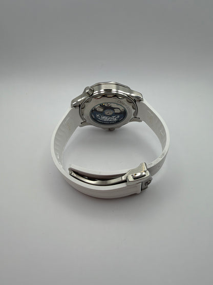 Thalassa Blue rear view showing a display caseback, white strap and silver-tone folding clasp.