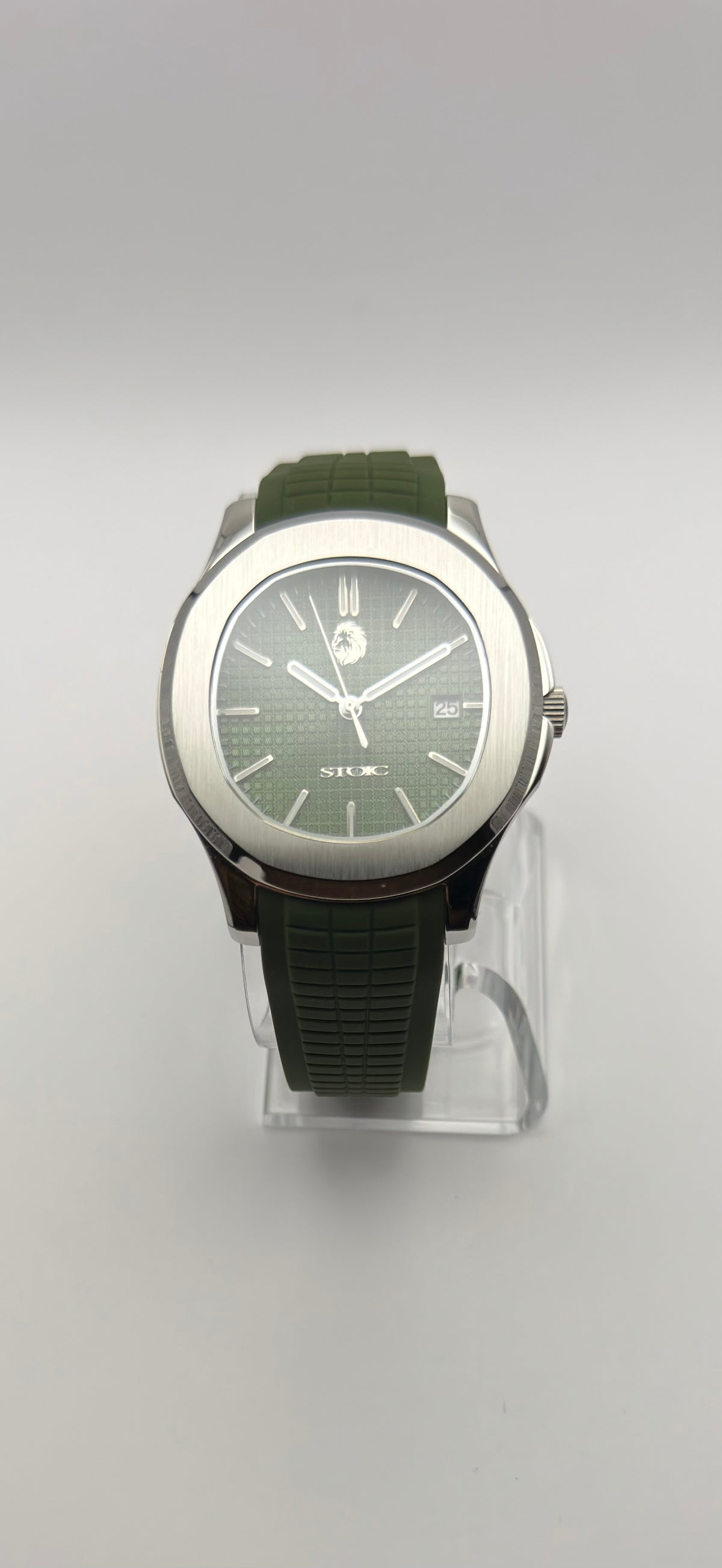 Viridian front view showing its green grid dial, date window and matching green strap.