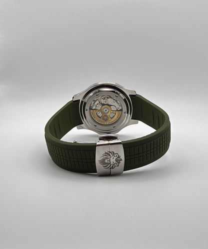 Viridian rear angle showing its display caseback and lion-marked folding clasp on the green strap.