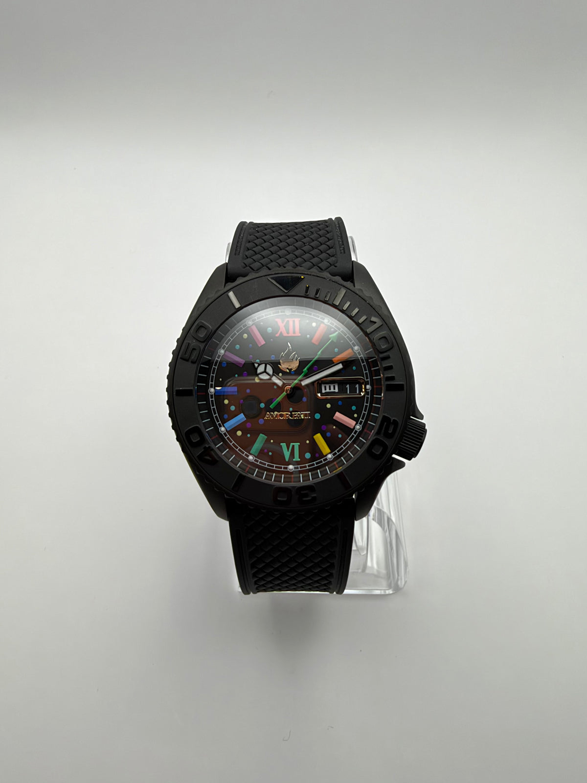 Front view of the black watch with multicolor hour markers, a day-date window and black strap.