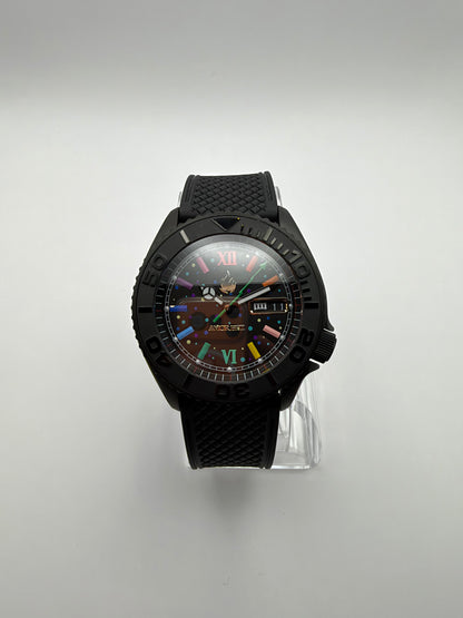Front view of the black watch with multicolor hour markers, a day-date window and black strap.